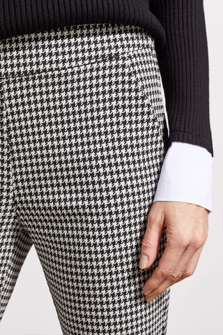 A model wearing Tribal Houndstooth Jacquard Pull On Pant in Black with a micro flare leg and front slash pockets.