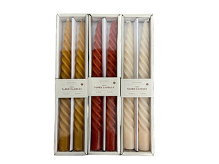 Assorted Gift Box Twist Candles in Cream, Burnt Orange, and Red.