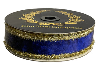 Spool of blue ribbon with gold spurred edge