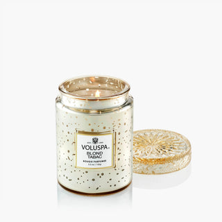 Voluspa Blond Tabac candle with decorative lid on a white background