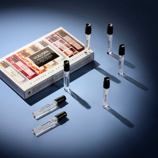 VOLUSPA perfume sample set with packaging on a blue background