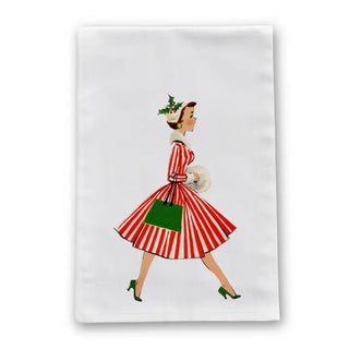 Tea towel with a vintage-style illustration of a woman in a red and white striped dress on a white background. Walking Woman Vintage Retro Christmas Tea Towel