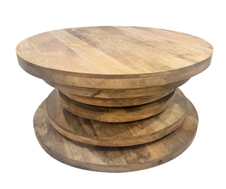 A round, wooden cocktail table with a rustic finish and a stacked look.