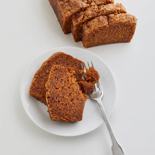 photo of the maison zoe ford carroty cake mix sliced and cut into with a fork 