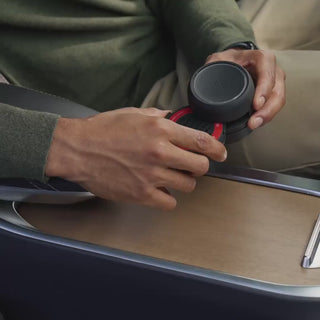 A black, cordless Pura Car Pro diffuser designed for use in vehicles.