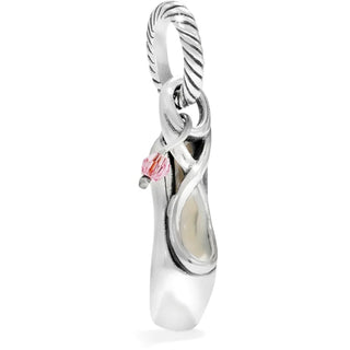 A silver-colored ballet shoe charm with a pink crystal embellishment and the word 'dance' etched on it. Brighton Ballet Shoe Charm