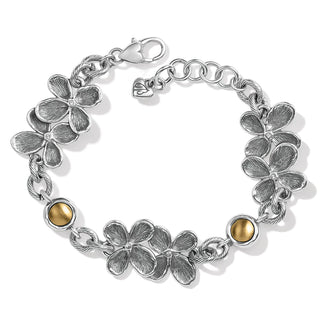 A silver bracelet with a floral pattern and yellow accents. Brighton Everbloom Bracelet
