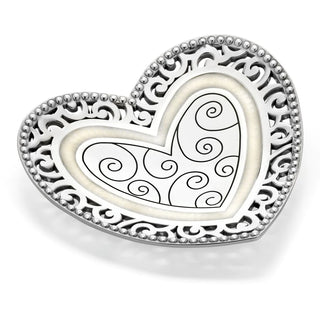 A silver-colored, heart-shaped trinket tray with pierced border and inner swirls. Brighton Lacie Daisy Trinket Tray