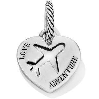 A silver-colored heart-shaped charm with an airplane in the center and the words 'LOVE ADVENTURE' inscribed, attached to a ball chain. Brighton Love Adventure Charm