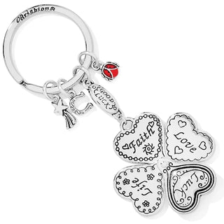 A silver-colored key fob featuring a four-leaf clover and heart designs with inscriptions such as 'Faith', 'Love', and 'Hope'. Brighton Lucky Clover Heart Key Fob