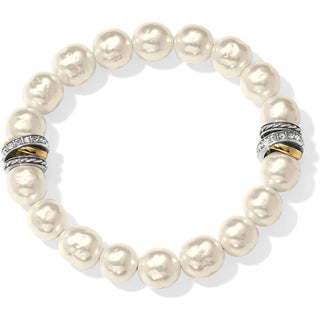 A pearl stretch bracelet with silver and gold rings stacked on top of each other, signifying a luxurious and sophisticated design. Brighton Neptune's Rings Pearl Stretch