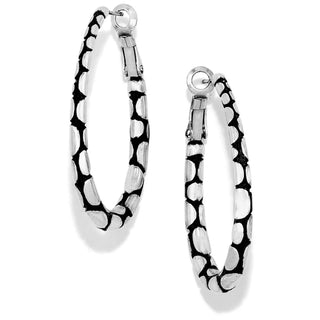A pair of oval hoop earrings with a pebble pattern in black and white color. Brighton Pebble Oval Hoop Earrings