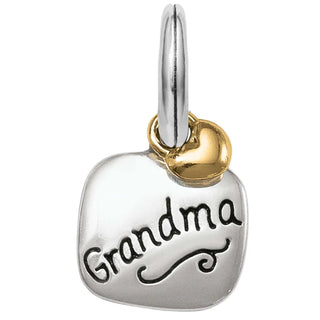 A silver heart-shaped charm with the inscription 'GRANDMA' in bold letters, attached to a gold-tone ring. Brighton World's Best Grandma Charm