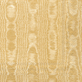 Close-up of a gold cocktail napkin with a textured pattern.