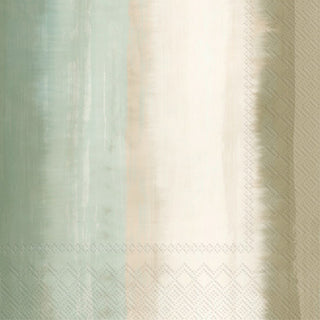 Close-up of a lunch napkin with a striped pattern in shades of beige and green.