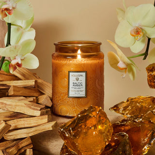 Voluspa Baltic Amber Large candle with orange accents
