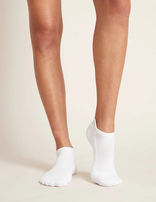 A pair of women's white sports socks with ankle tab, made from organic bamboo
