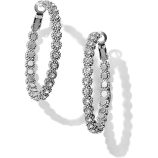 A pair of silver-colored, crystal-encrusted medium hoop earrings with a floral motif design. Brighton Twinkle Splendor Medium Hoop